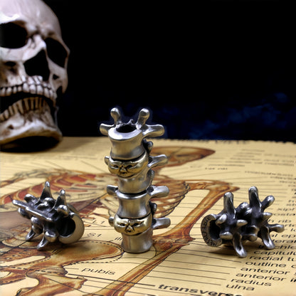 Disc Goblin – Anatomical Spine Knife Bead | Bronze and White Brass EDC Paracord Bead with Grinning Disc Face